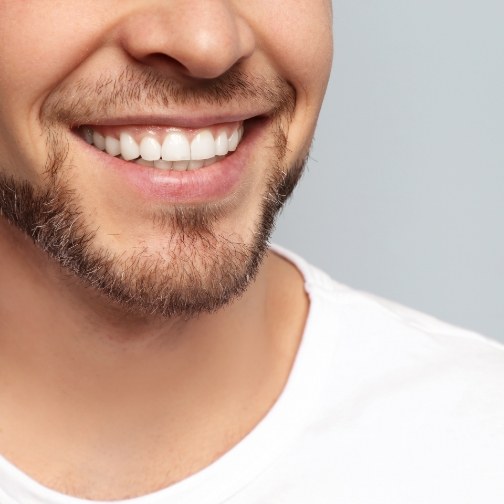 Man with short beard smiling