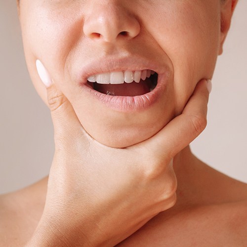 a close-up of a patient’s mouth with TMJ disorder