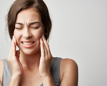 a patient suffering from jaw pain