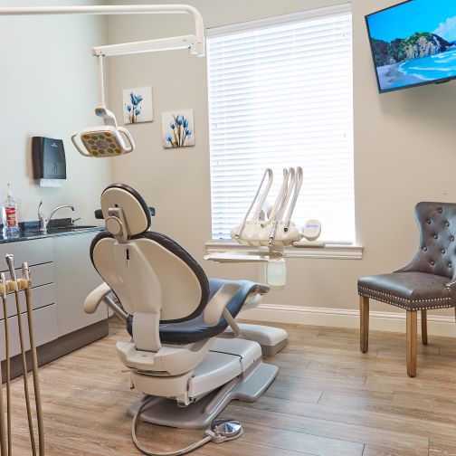Dental treatment room with sunlight streaming in through window