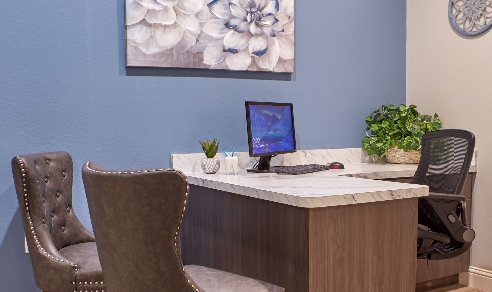 Desk with computer in dental consultation room