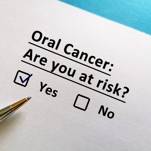 Form with box checked yes under the question oral cancer are you at risk