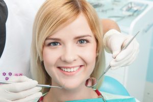 Woman having a dental examination. 